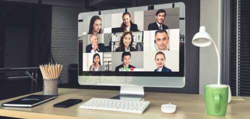 Image of a computer with a conference video call on the screen on Skill Developers' website
